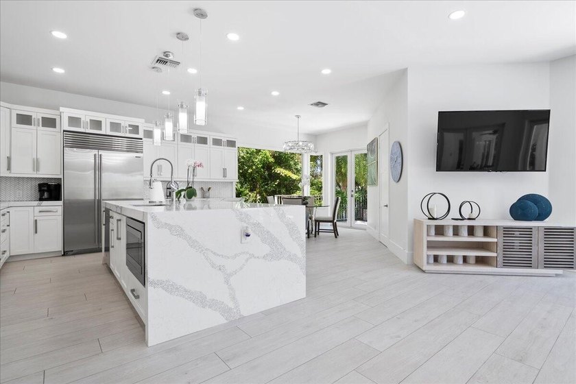 Come see this meticulously renovated residence is located in the - photo 9