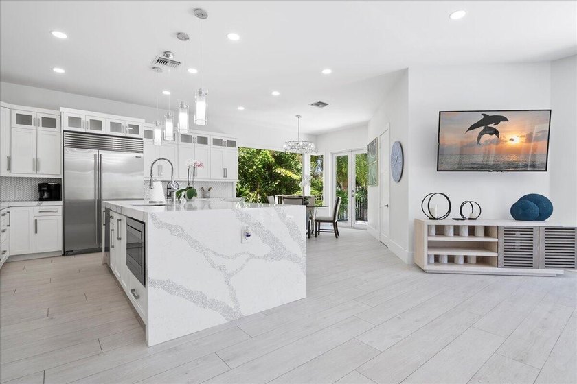 Come see this meticulously renovated residence is located in the - photo 10