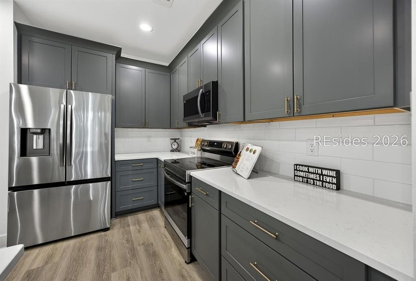 THOUGHTFULLY RENOVATED home in a prime location of the highly - photo 12