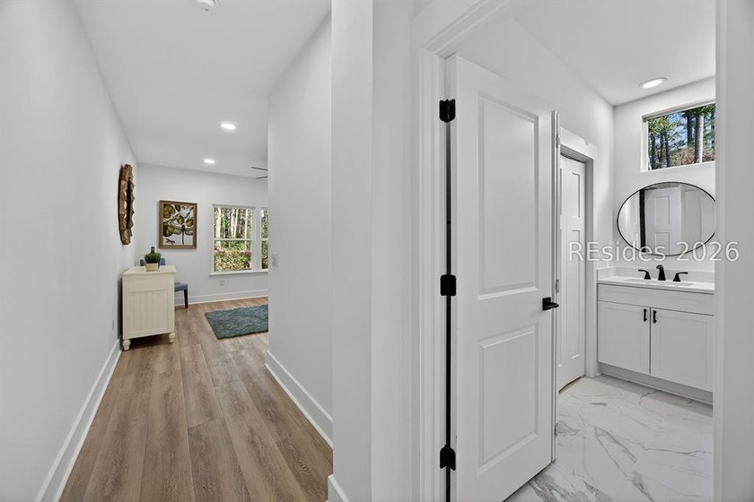 THOUGHTFULLY RENOVATED home in a prime location of the highly - photo 21