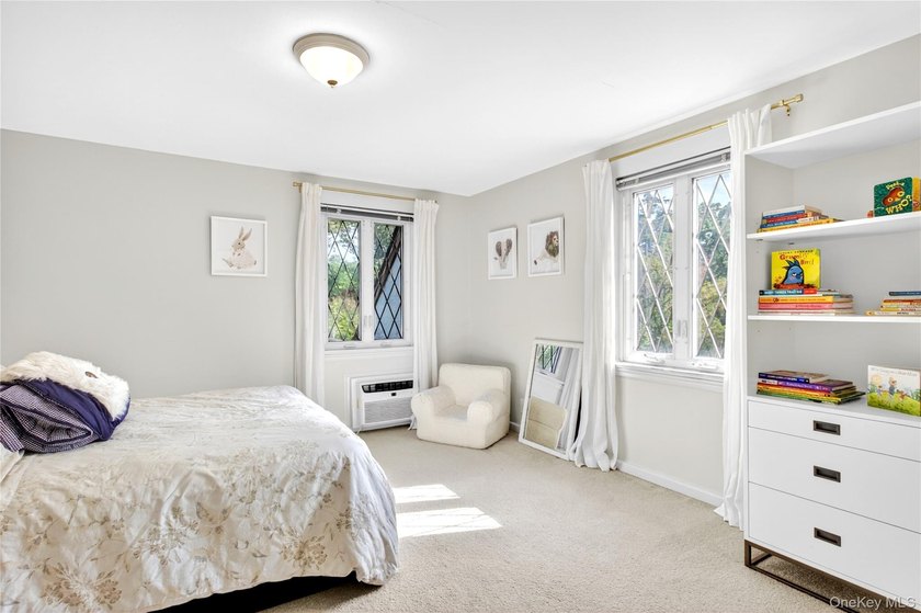 Storybook charm meets timeless elegance in this classic Tudor - photo 15