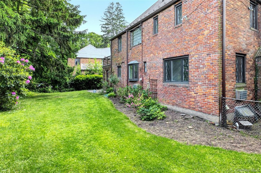 Storybook charm meets timeless elegance in this classic Tudor - photo 19
