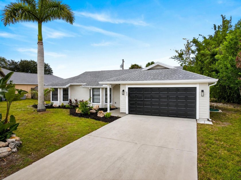 Welcome home to this beautifully updated modern residence where - photo 3