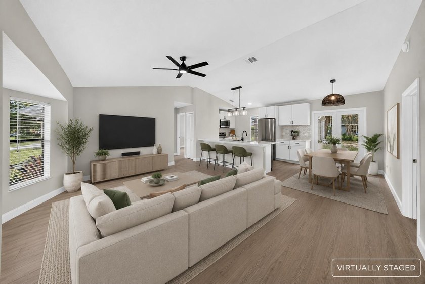 Welcome home to this beautifully updated modern residence where - photo 7