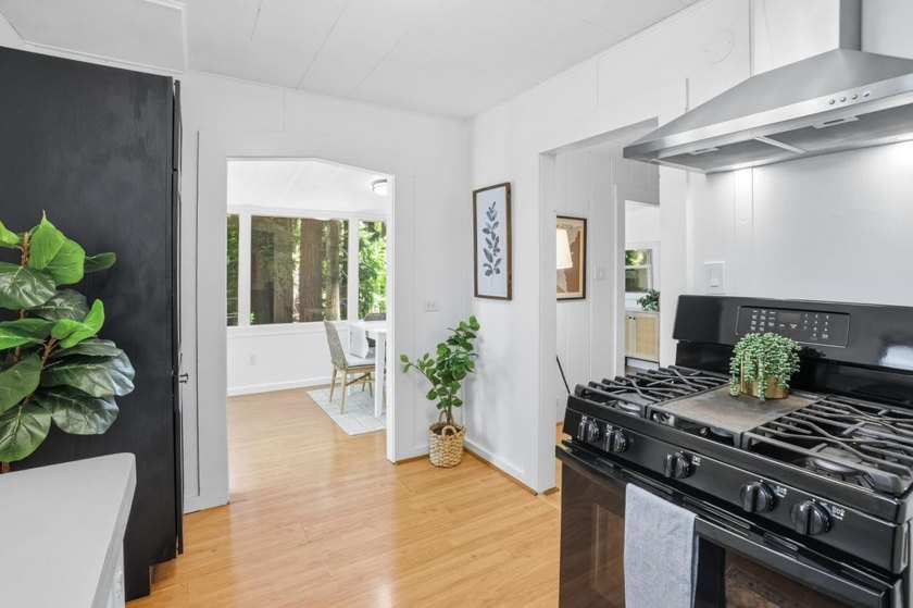 Nestled beneath a canopy of majestic redwood trees on a spacious - photo 11