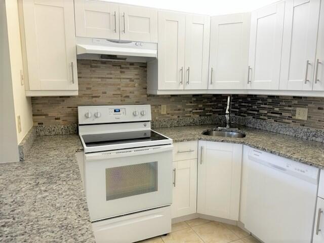 Welcome to this charming 55+ two-story condo located on the - photo 13
