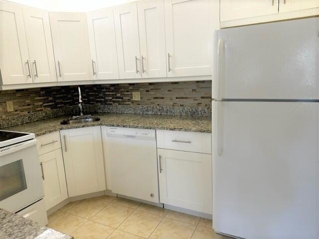 Welcome to this charming 55+ two-story condo located on the - photo 14