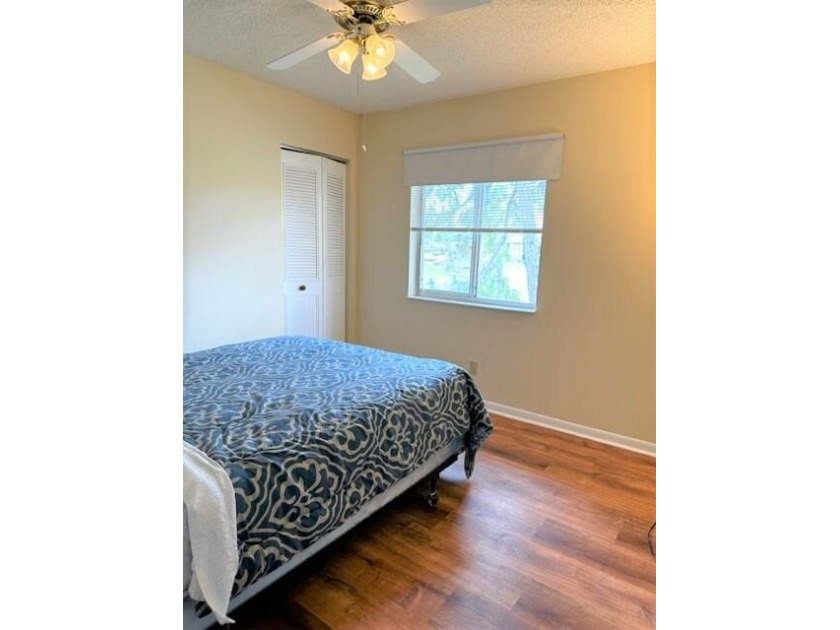 Welcome to this charming 55+ two-story condo located on the - photo 15