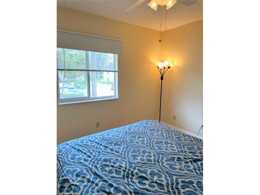 Welcome to this charming 55+ two-story condo located on the - photo 17