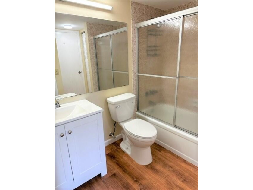 Welcome to this charming 55+ two-story condo located on the - photo 18