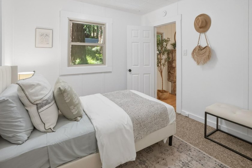 Nestled beneath a canopy of majestic redwood trees on a spacious - photo 21
