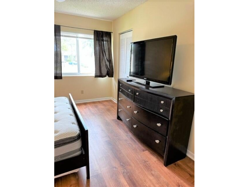 Welcome to this charming 55+ two-story condo located on the - photo 23