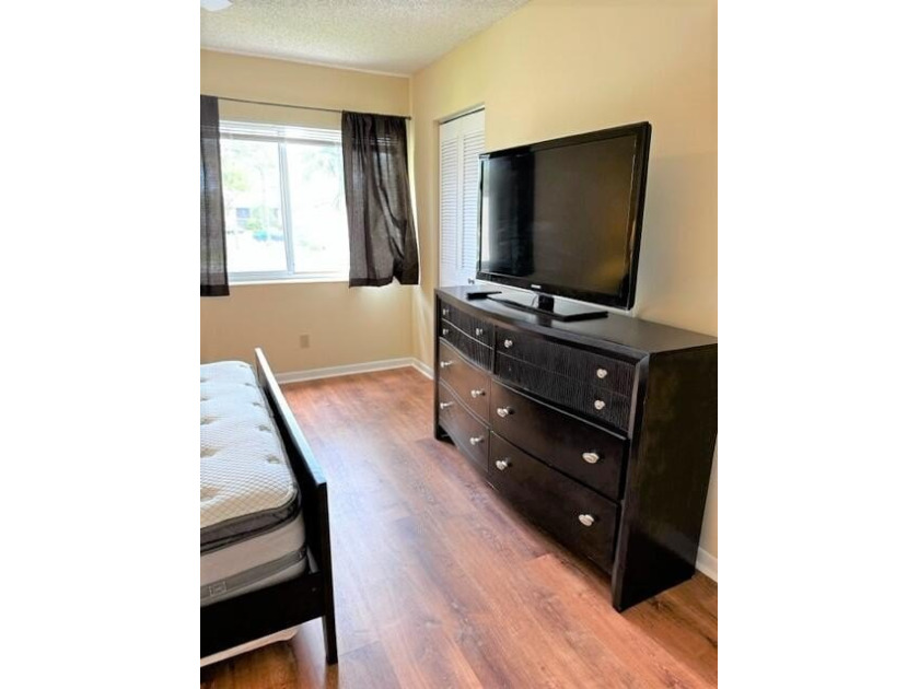 Welcome to this charming 55+ two-story condo located on the - photo 24