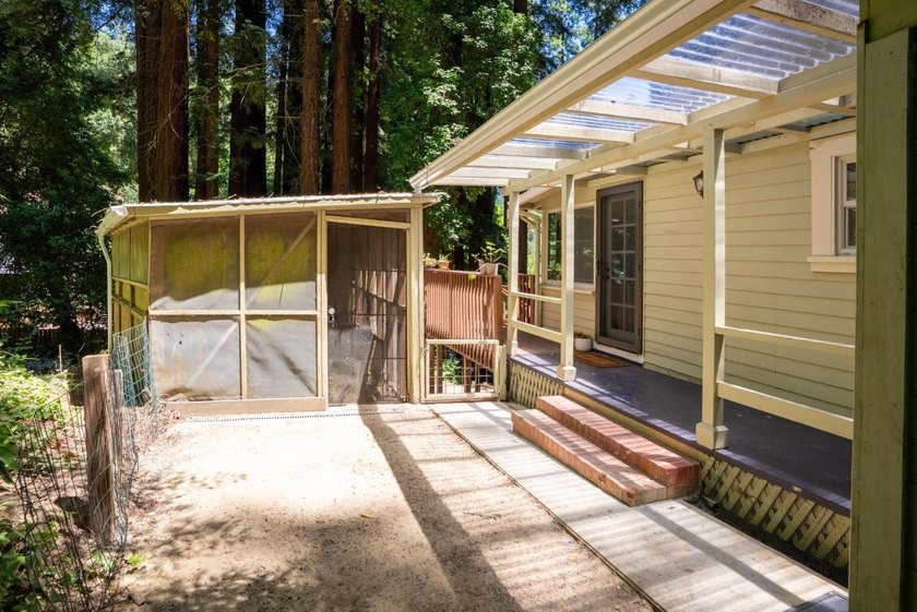 Nestled beneath a canopy of majestic redwood trees on a spacious - photo 27