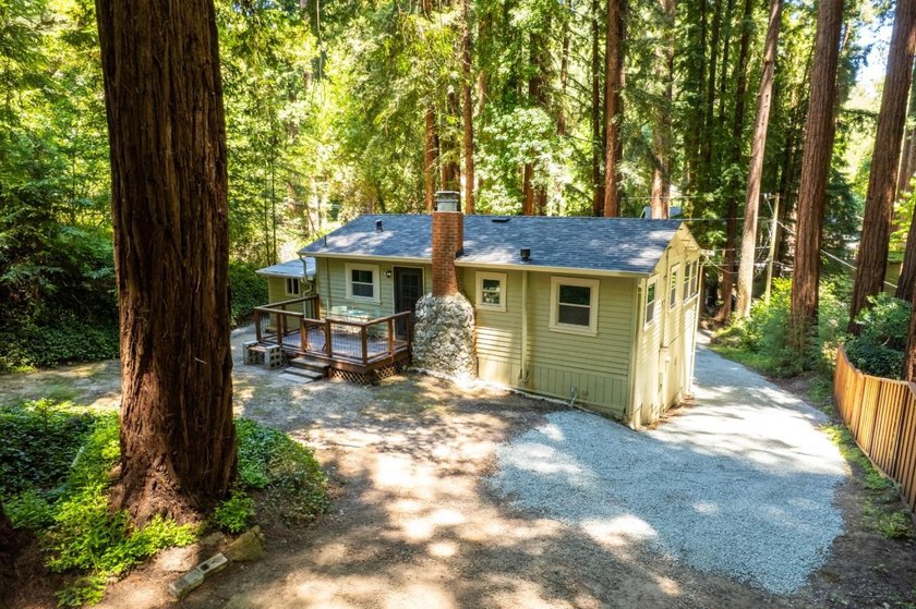 Nestled beneath a canopy of majestic redwood trees on a spacious - photo 41