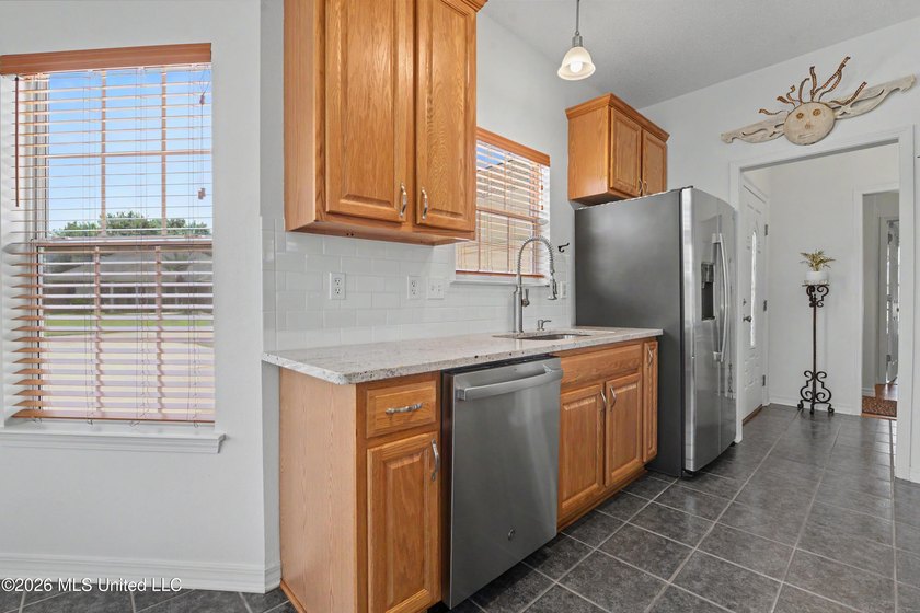 This Fabulous Home has so Many Custom Upgrades and Renovations!! - photo 5