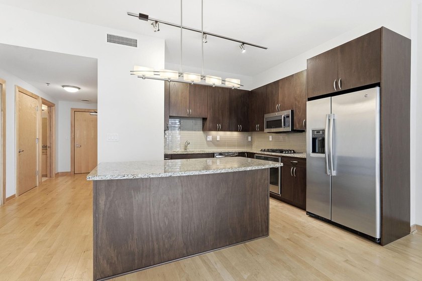 Modern Mill District Condo with a spacious floorplan flooded - photo 19