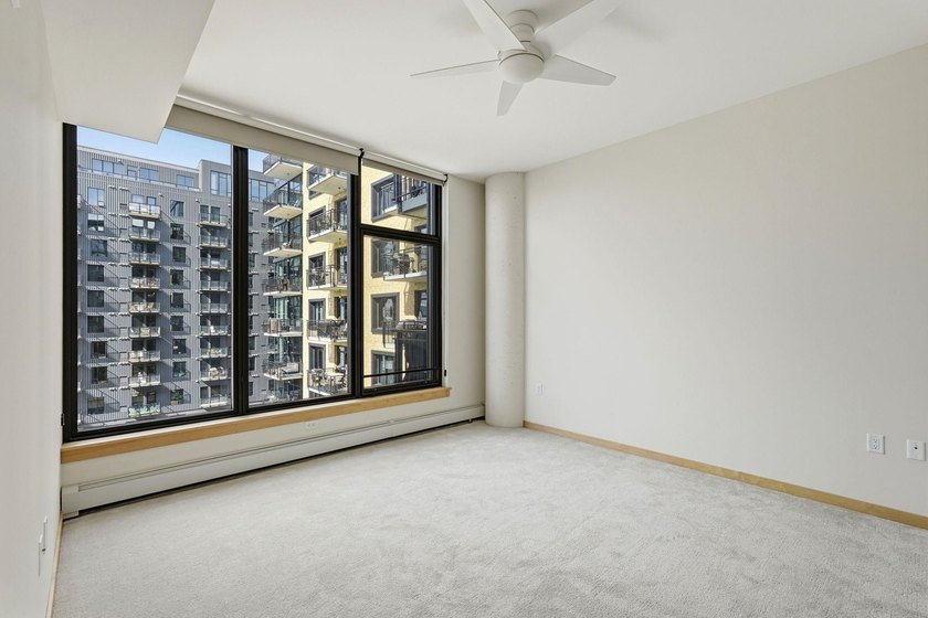 Modern Mill District Condo with a spacious floorplan flooded - photo 23