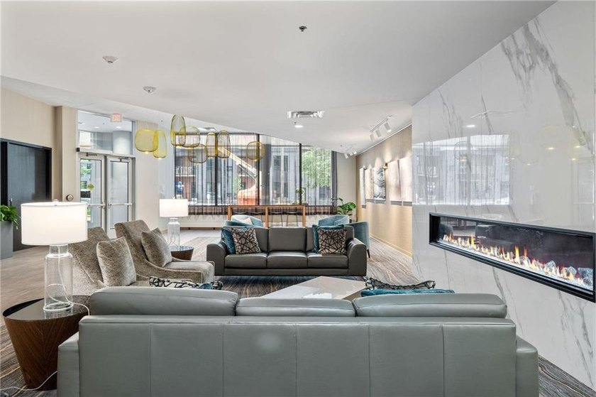 Modern Mill District Condo with a spacious floorplan flooded - photo 39