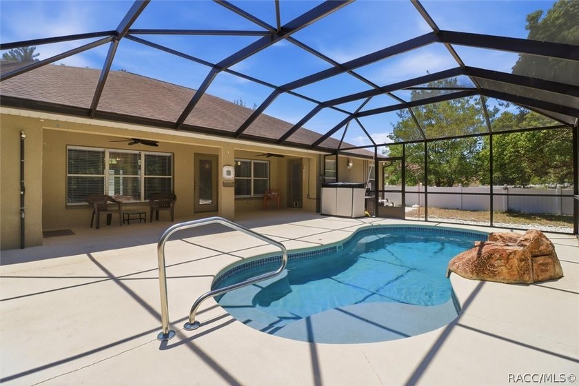 Beautifully updated, this 4-bedroom plus office pool home is - photo 2