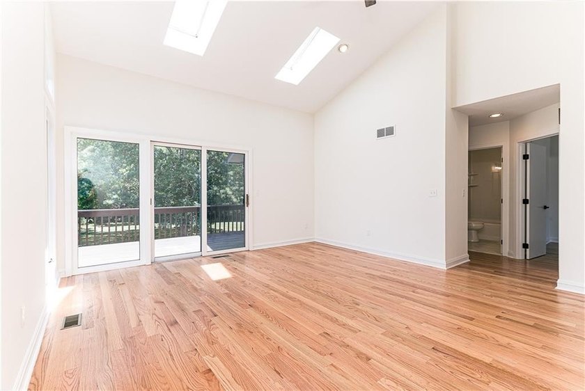 A rare find! Welcome to this sought-after one level end unit in - photo 11
