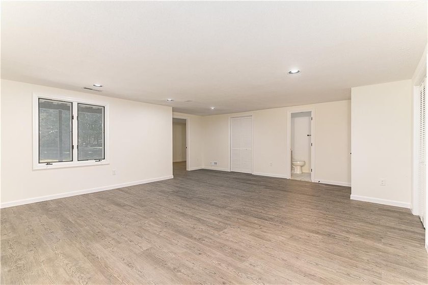 A rare find! Welcome to this sought-after one level end unit in - photo 20