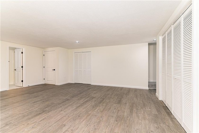 A rare find! Welcome to this sought-after one level end unit in - photo 21