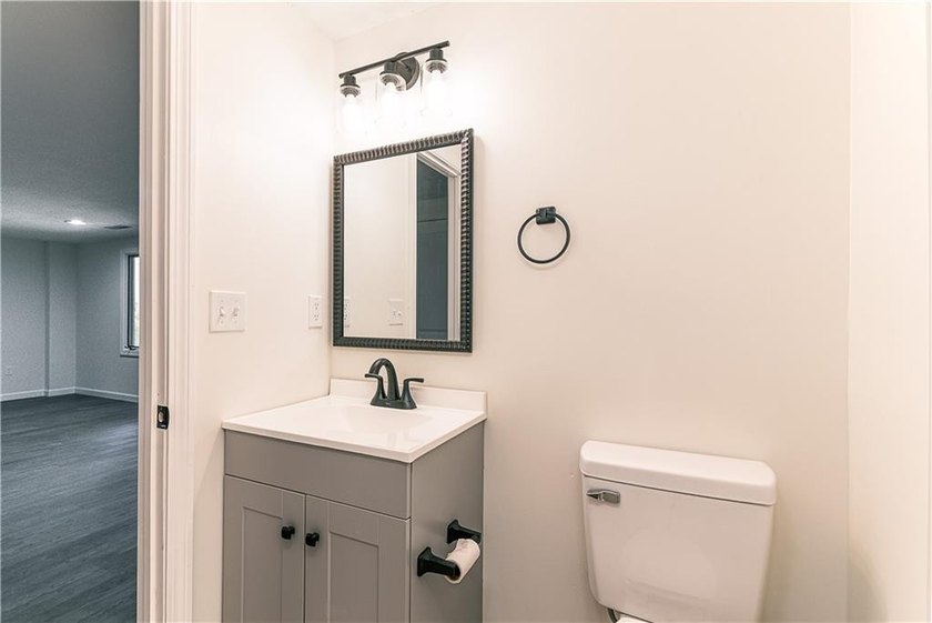 A rare find! Welcome to this sought-after one level end unit in - photo 24