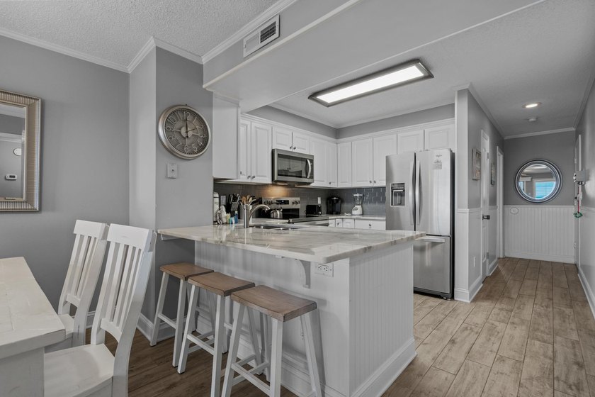 Experience coastal living at its finest in this beautifully - photo 22