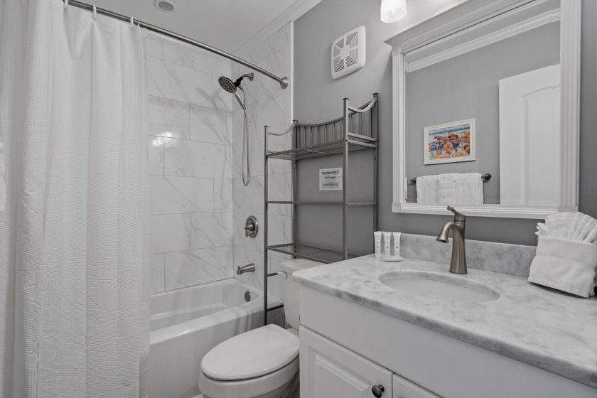 Experience coastal living at its finest in this beautifully - photo 44
