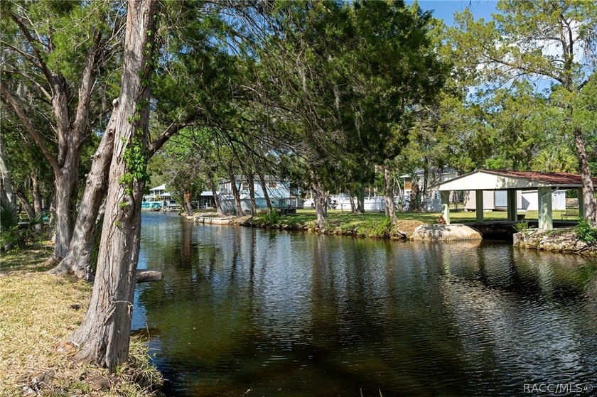 This brand-new stilt home sits on a deep-water canal in the - photo 2