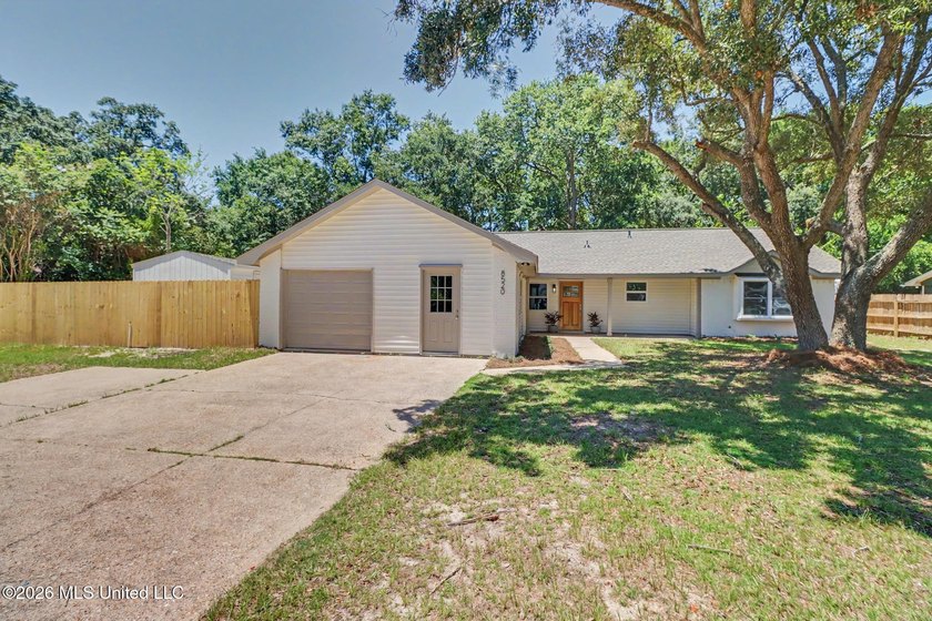 Welcome home to this stunning, fully remodeled residence that - photo 2