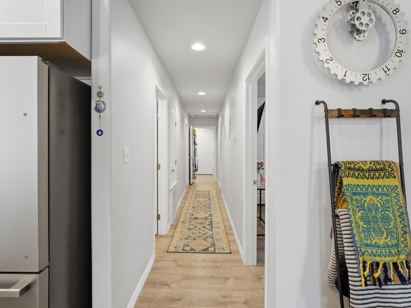 Built in 2021, this 3-bedroom, 2-bath coastal cottage sits on - photo 11