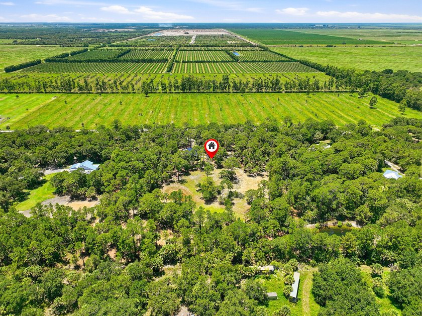 Build your dream oasis on this private, gated 6+ acre heavily - photo 2