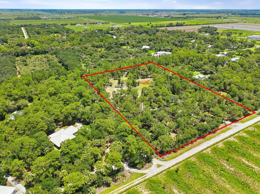Build your dream oasis on this private, gated 6+ acre heavily - photo 5