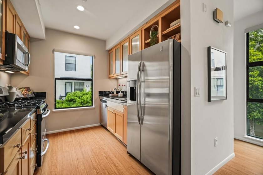 Welcome to 1202 66th St, a bright and modern end-unit tri-level - photo 10
