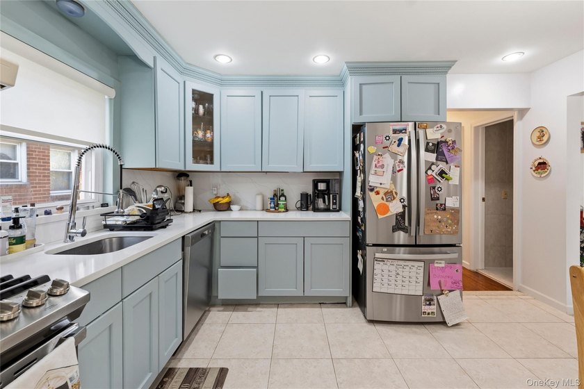 Spacious and well-maintained legal two-family home located in - photo 12