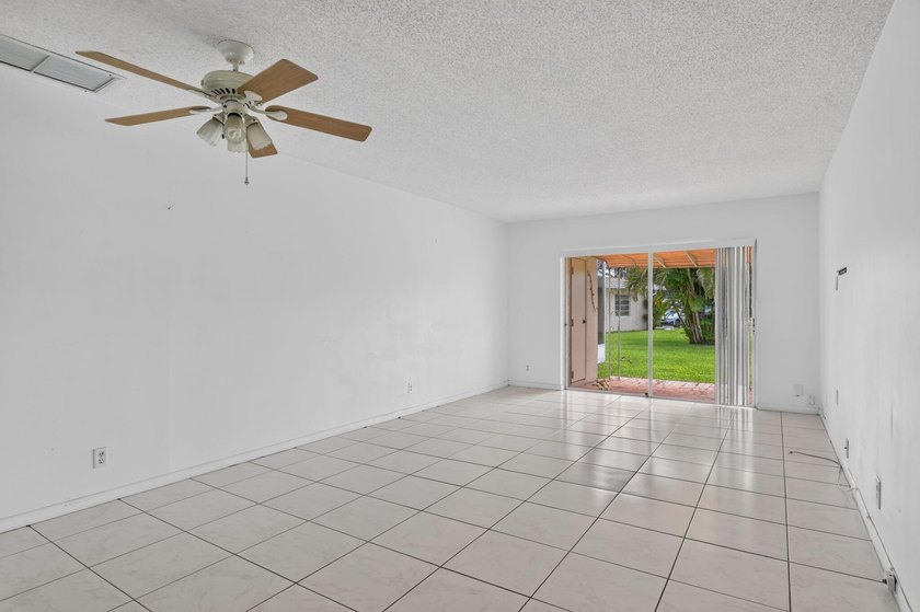 Welcome to Boca Lakes, a 55+ gated community in the heart of - photo 12