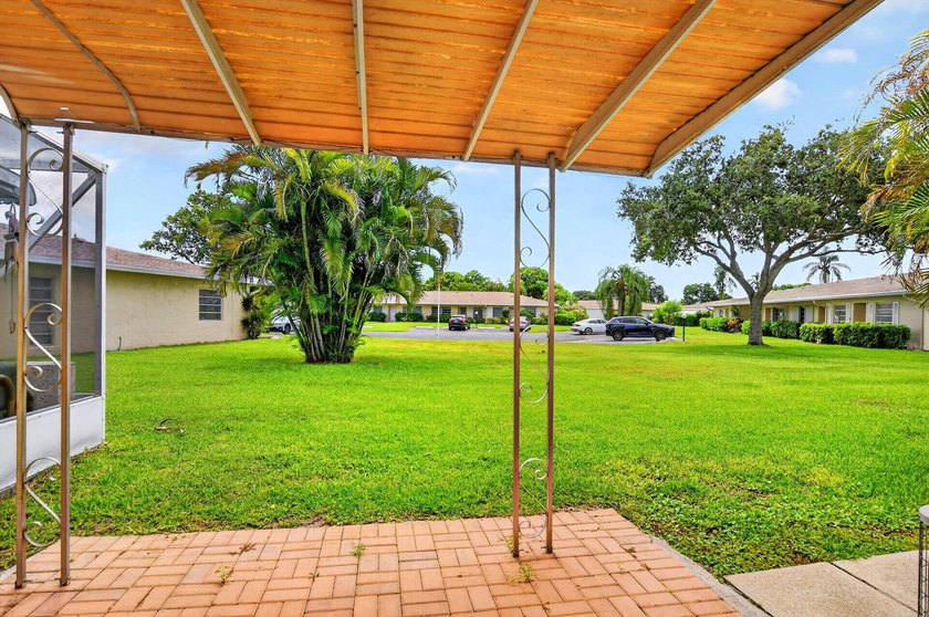Welcome to Boca Lakes, a 55+ gated community in the heart of - photo 23