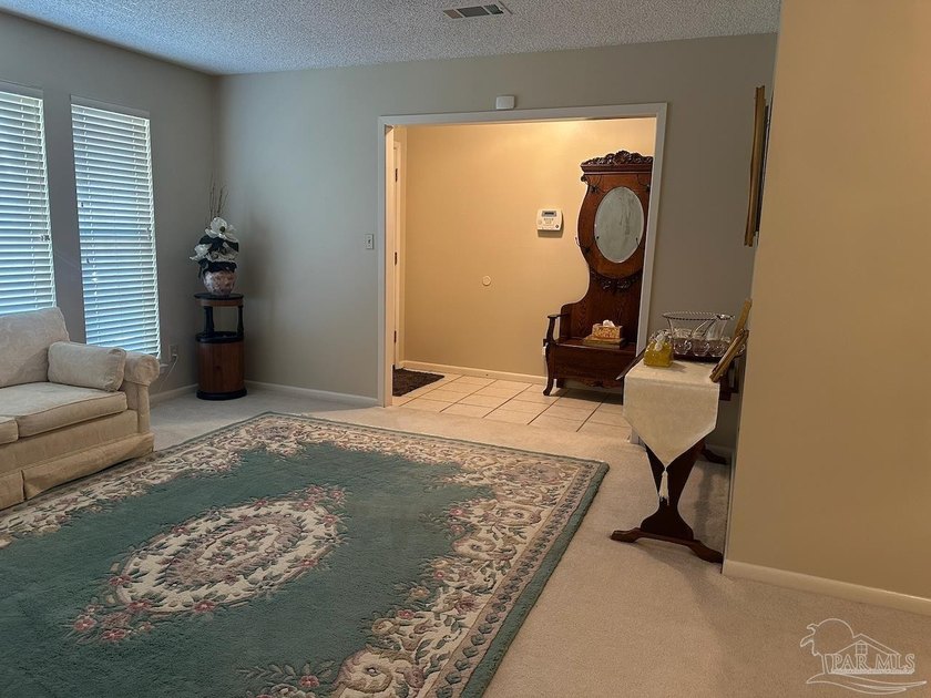 This spacious 4-bedroom, 2 bath home offers a functional layout - photo 18