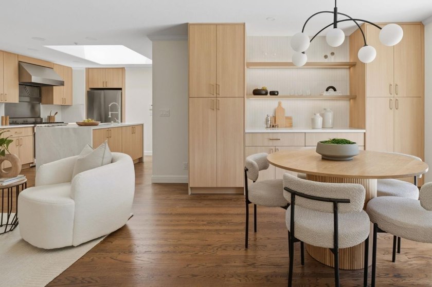 Situated on a picturesque tree-lined street and located down a - photo 3