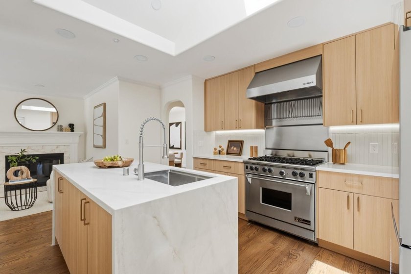 Situated on a picturesque tree-lined street and located down a - photo 7