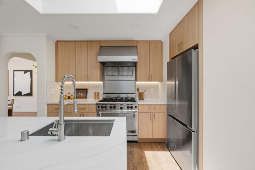 Situated on a picturesque tree-lined street and located down a - photo 10