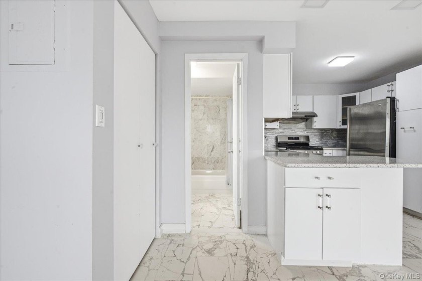Duplex Penthouse Condo with Outdoor Space and Deeded Parking in - photo 20
