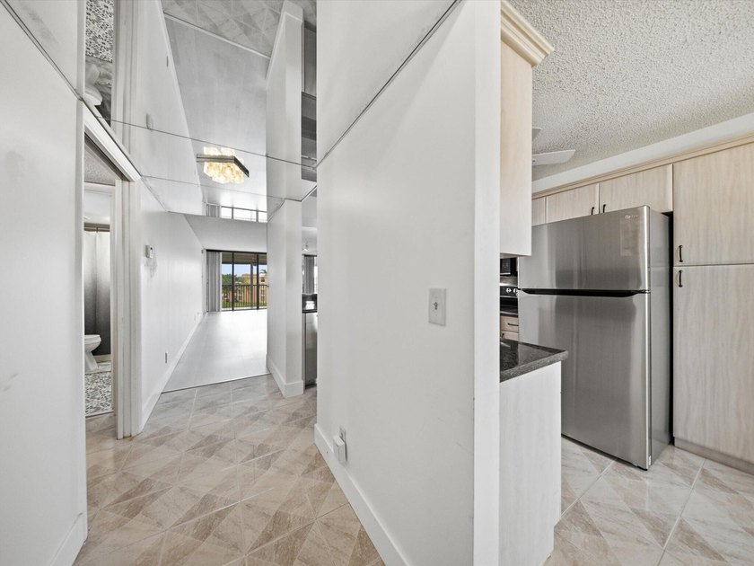 Enjoy beautiful water views and total peace of mind from this - photo 4