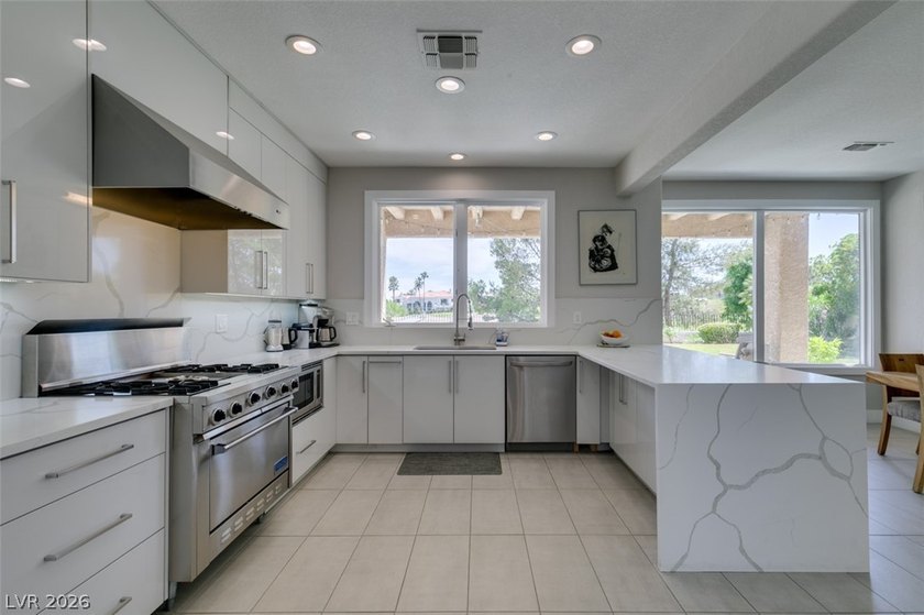 STUNNING RECENTLY RENOVATED CONTEMPORARY HOME ON AN OVERSIZED - photo 11