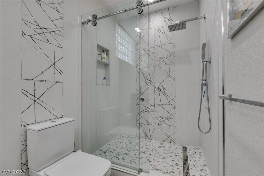 STUNNING RECENTLY RENOVATED CONTEMPORARY HOME ON AN OVERSIZED - photo 22