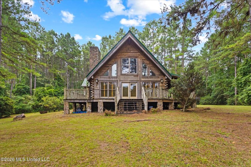 Welcome to Nola Pines! This unique property is tucked away on - photo 4
