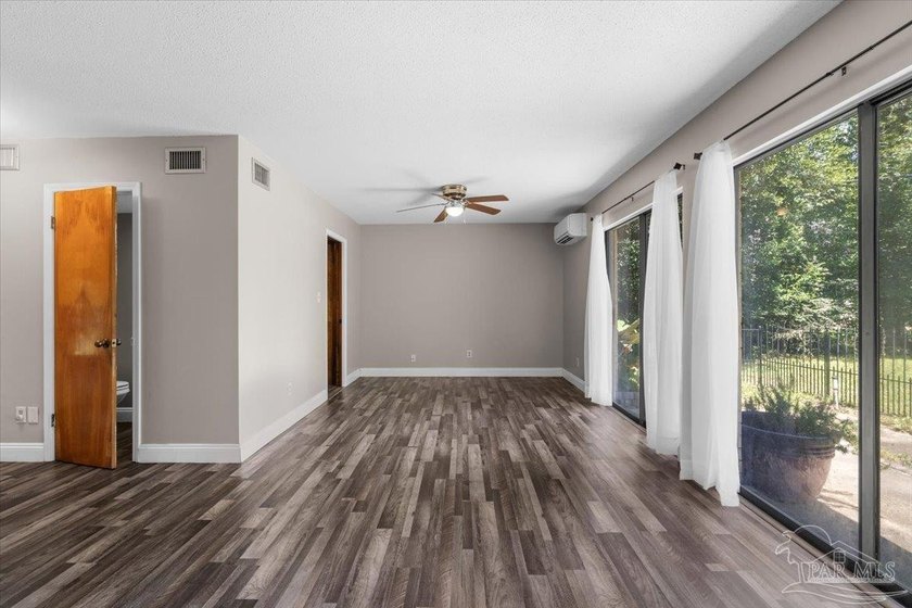 Nestled on a sprawling, pie-shaped 0.45-acre lot, this highly - photo 11