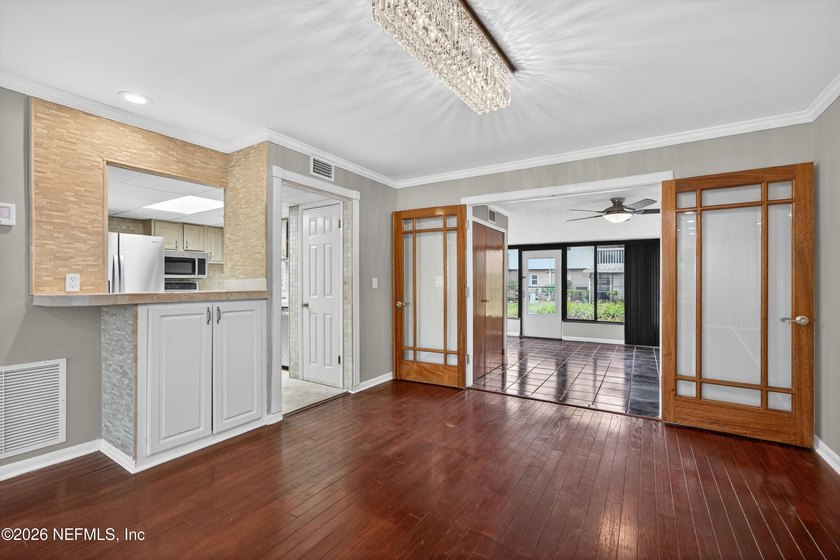 This beautiful spacious townhouse features hardwood floors - photo 8